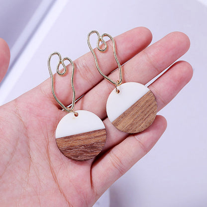 Boucles d'oreilles rondes géométriques en bois