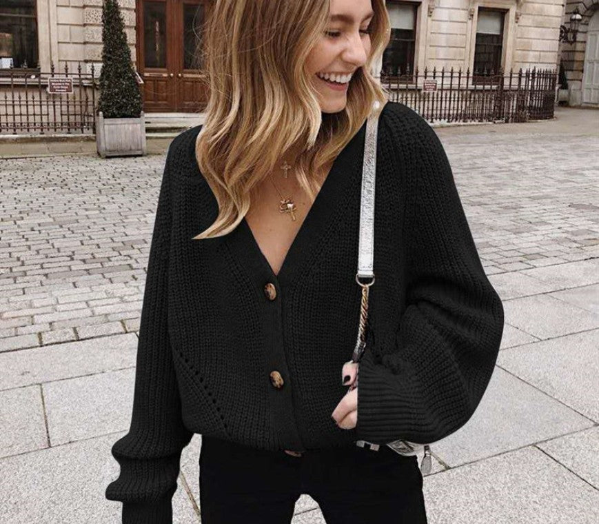 suéter de mujer de color liso con cuello en V y botones