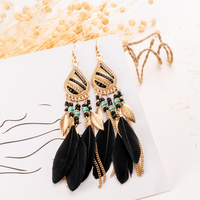 Boucles d'oreilles plumes et boucles d'oreilles perles