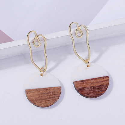 Boucles d'oreilles rondes géométriques en bois