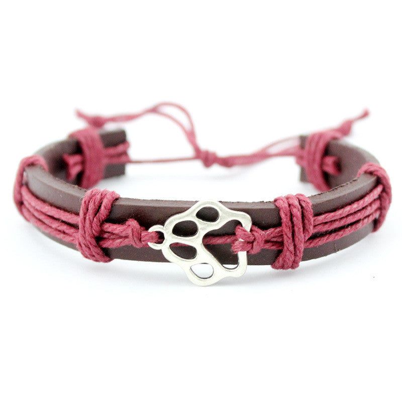 Pulsera de cuero de vaca tejida a mano con pata de perro de joyería de exportación de comercio exterior europeo y americano