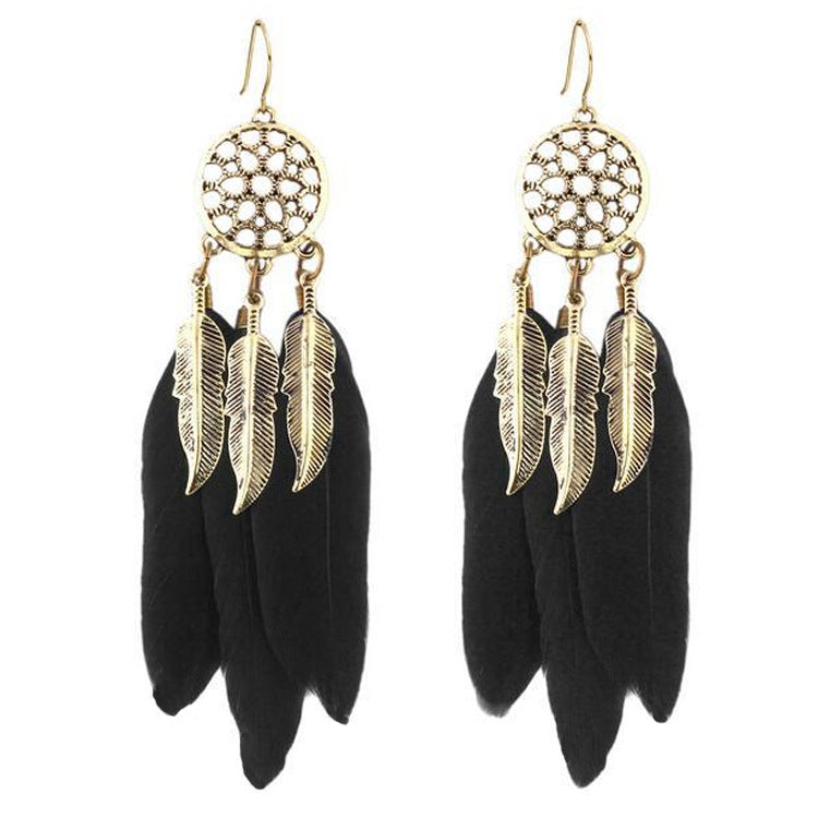 Boucles d'oreilles longues pompons