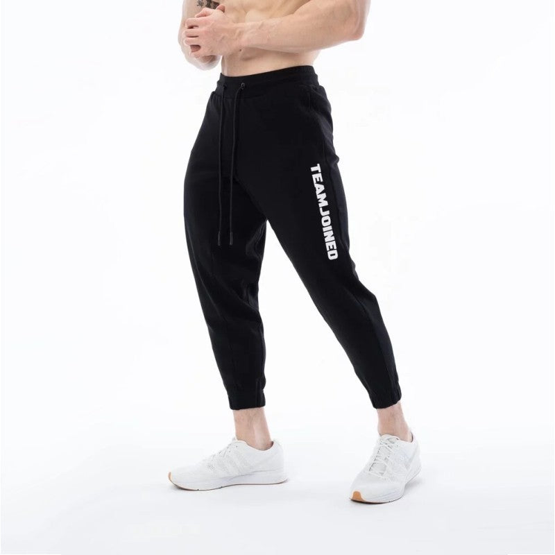 Pantalones de chándal deportivos sueltos de algodón para entrenamiento físico para hombres