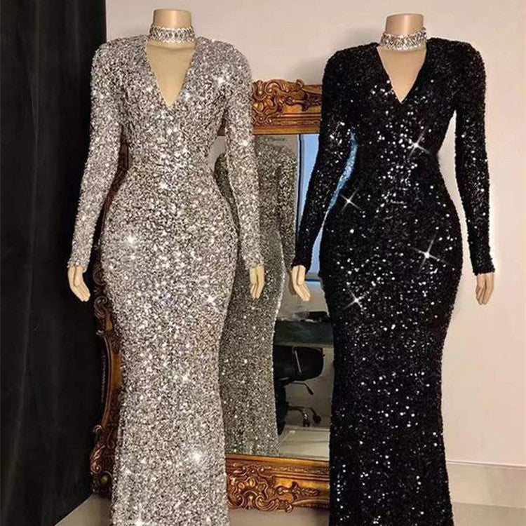 Robe de soirée grise à manches longues et sequins